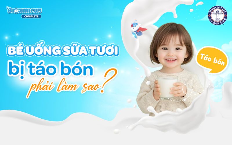 bé uống sữa tươi bị táo bón