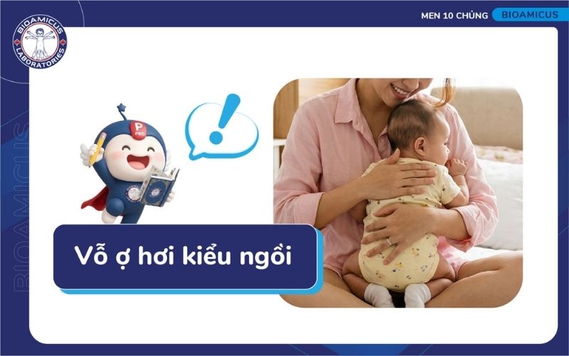 Vỗ ợ hơi cho trẻ sơ sinh ở tư thế ngồi